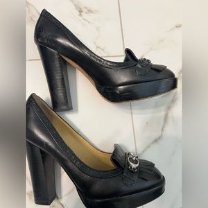 Coach black heels (4.5”) Size 6.5. Worn only a handful of times.